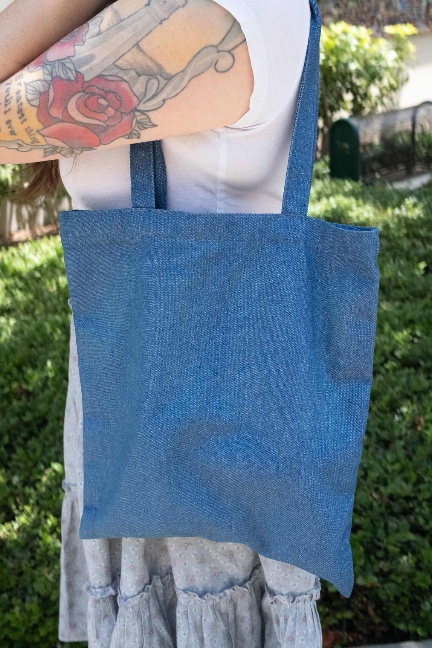 Burning Through Chapters Denim Tote Bag